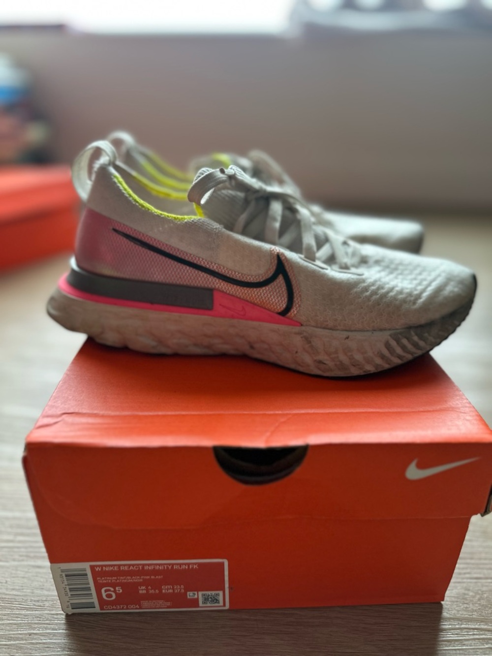Nike Women's Running Shoes in Light Gray with Pink and Neon Yellow Accents